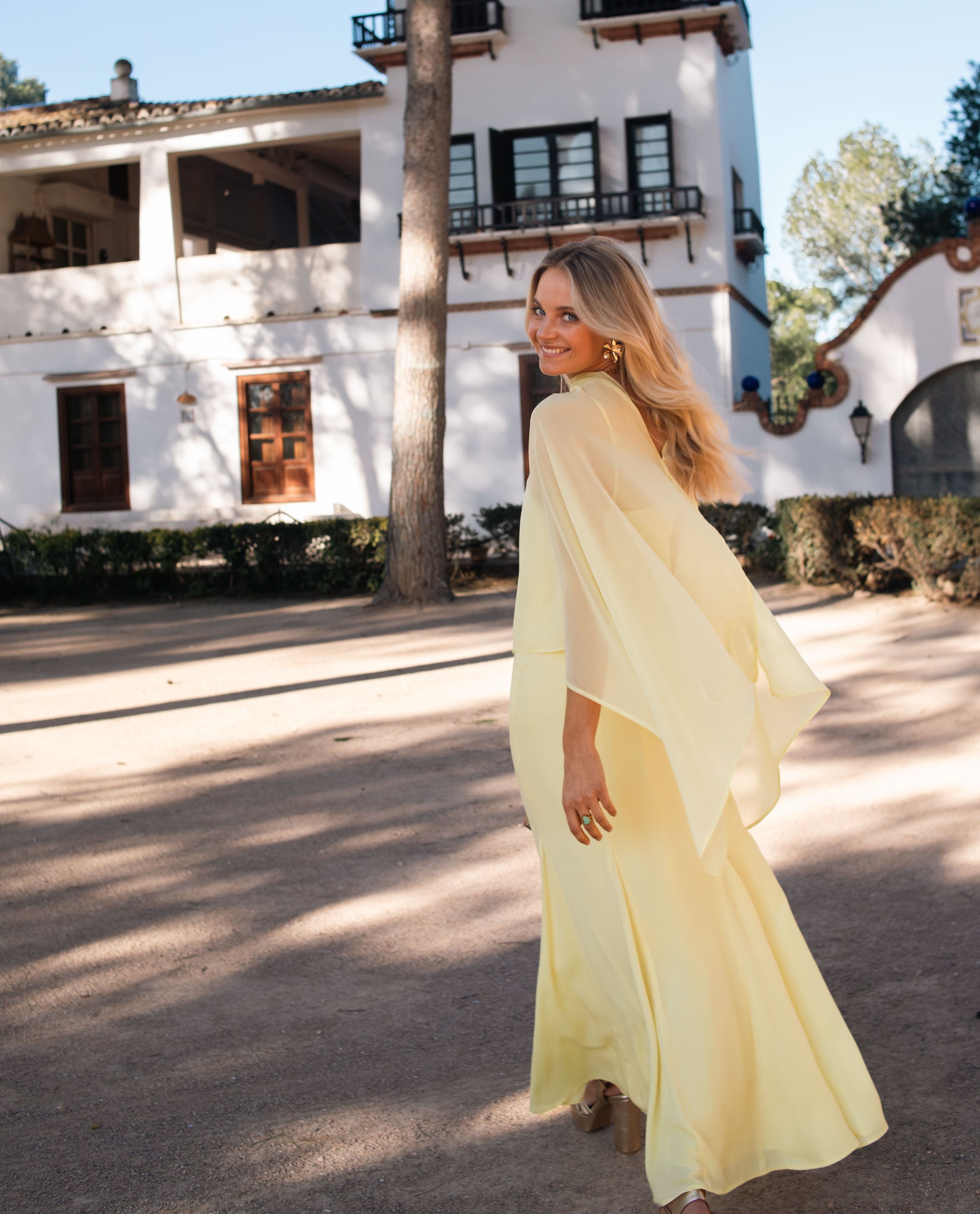 cape dress yellow Canary Crown Gown Teuta Matoshi Crafted from soft Yellow Wedding Guest Cape |