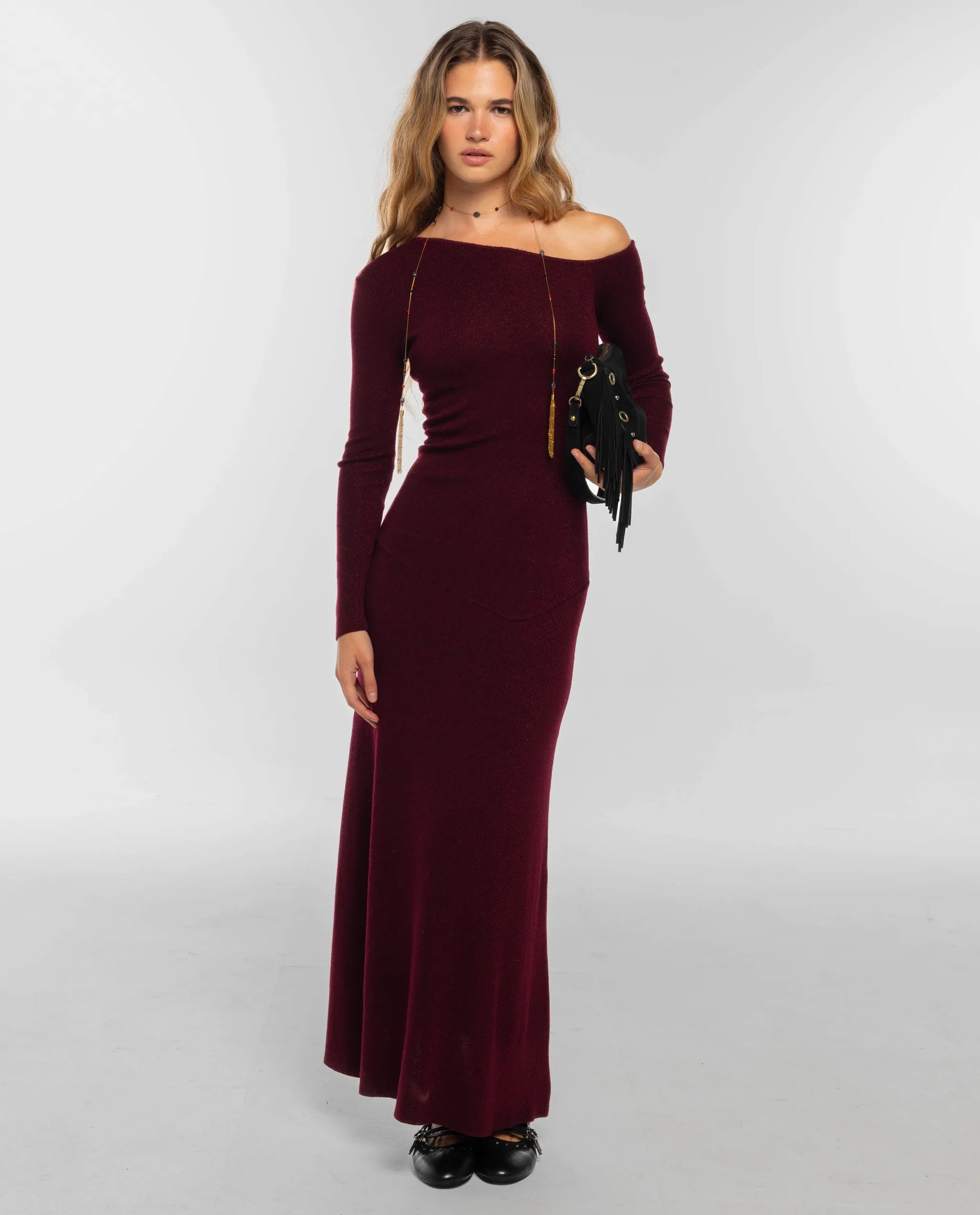Burgundy knit dress with asymmetrical neckline
