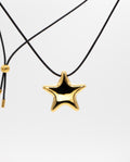 LUCKY STAR NECKLACE · GOLD PLATED STEEL