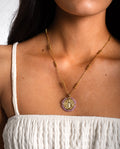AMETHYST MEDALLION NECKLACE · GOLD PLATED STEEL