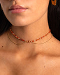 COLLAR PEBBLES ORANGE AGATE · ACERO BAÑO ORO
