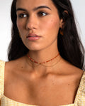 COLLAR PEBBLES ORANGE AGATE · ACERO BAÑO ORO