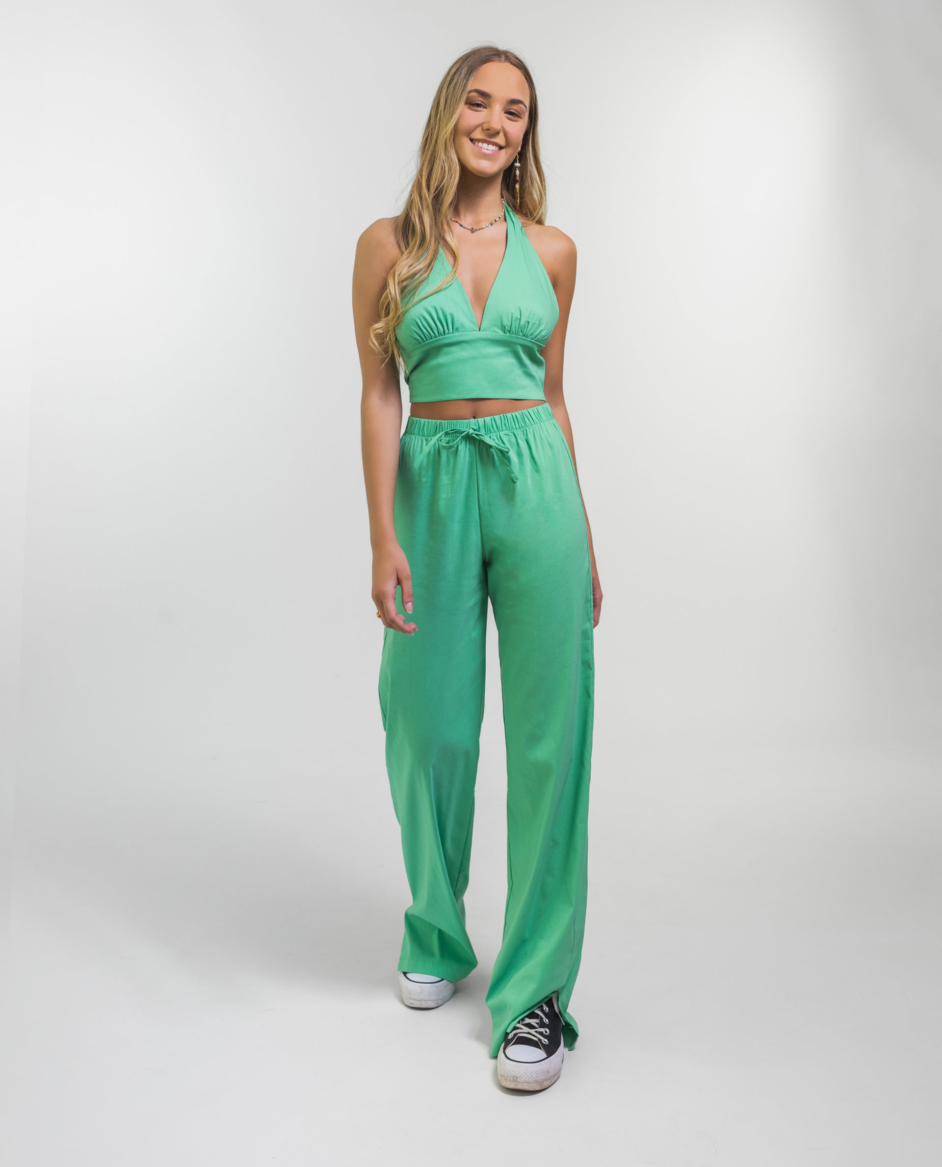 PANTALÓN PALM BEACH | Pantalón Fluido Verde de Mujer con Aberturas | THE-ARE