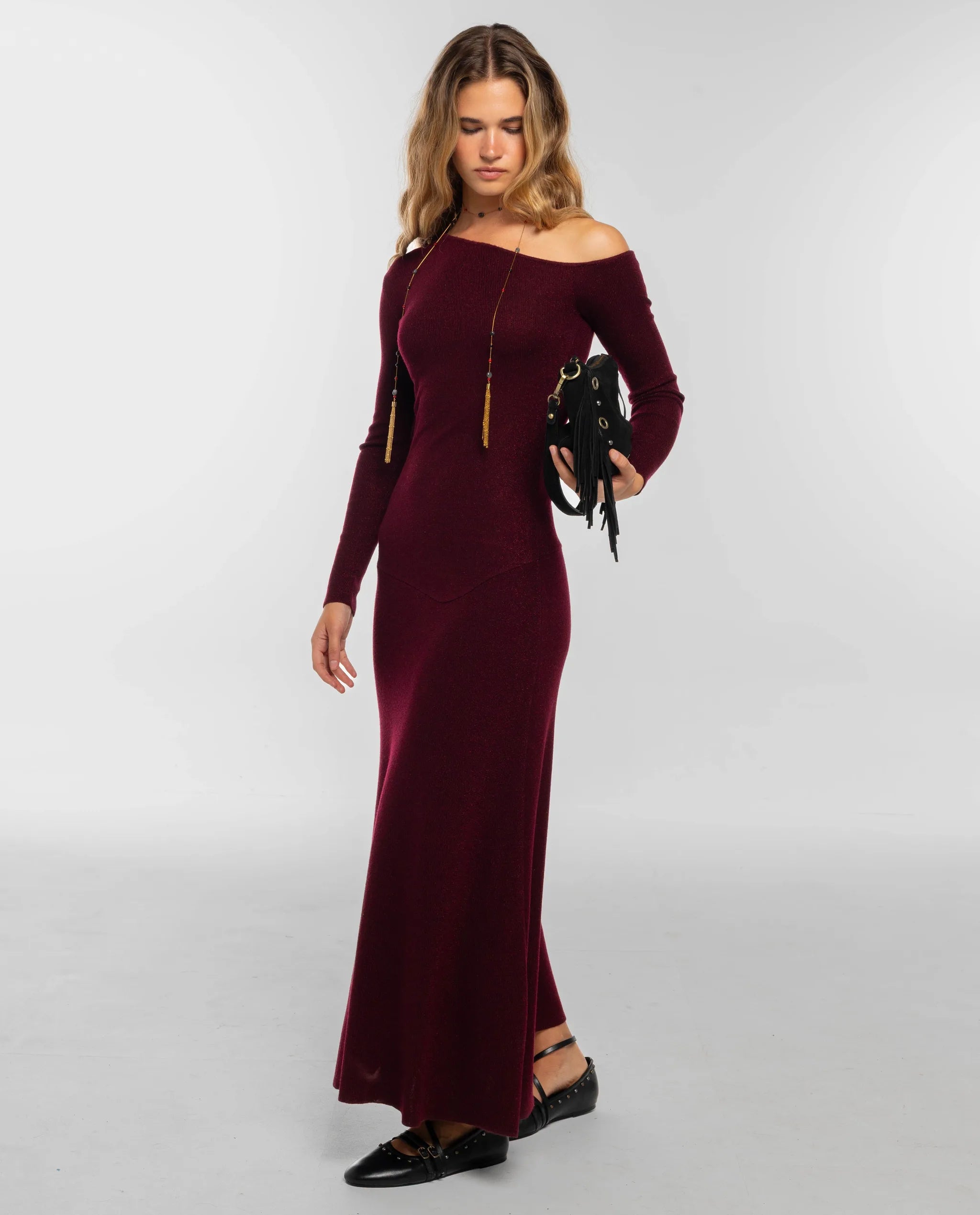 Burgundy knit dress with asymmetrical neckline