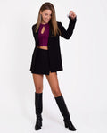 HAILEY SKIRT | Minissaia preta com fenda | THE-ARE Party Collection