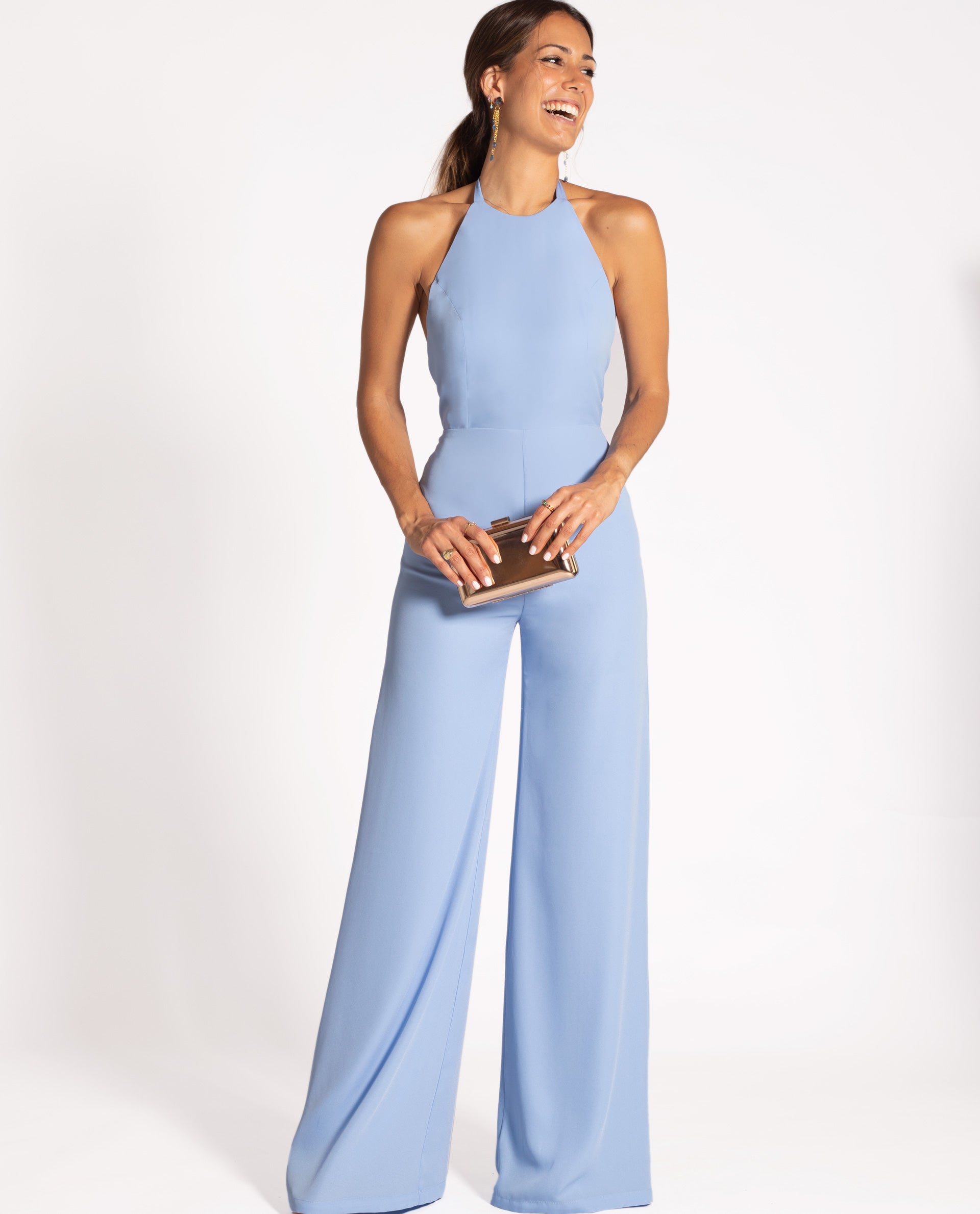 Blue long jumpsuit with halter neckline open back. THE-ARE